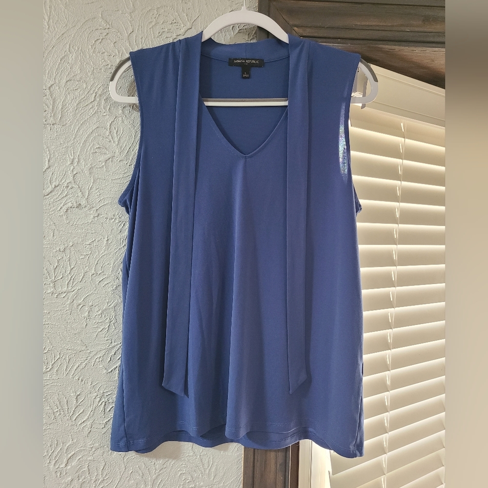blue Banana Republic sleeveless blouse featuring a v-neck and long tie details